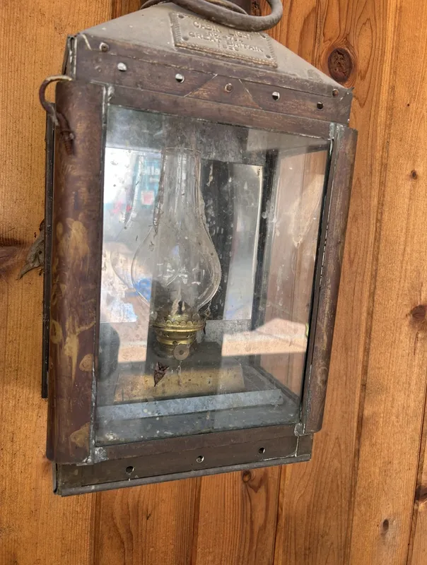Before: Glass on an antique porch lantern